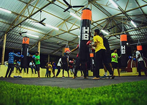 Image of Hard Bodies Professional Synthetic Leather Boxing Punching Bag for Kickboxing, Muay Thai Along with Hanging Chain , Hand Wraps & Key Chain ( Filled ) (3 Feet Pro Punching Bag Black & Red)